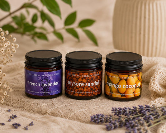 Three lidded mini candle jars arranged side by side for the Discovery Candle Set