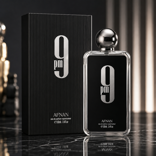 Afnan 9 PM eau de parfum bottle beside its black box