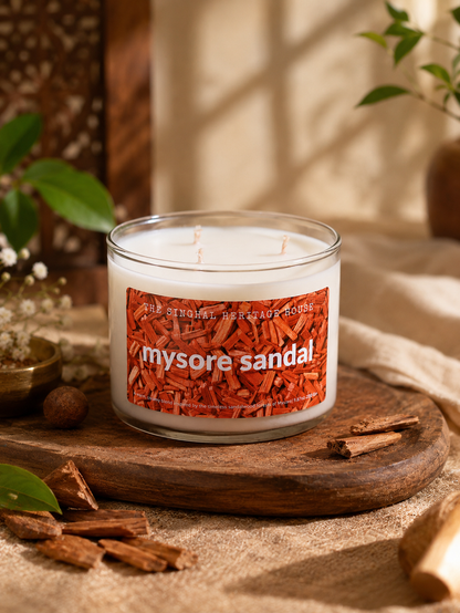 Three-wick Mysore sandal scented candle in a glass jar
